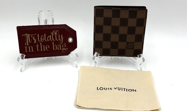 Authentic Louis Vuitton men’s Marco wallet, Damier Ebene with branded dustbag