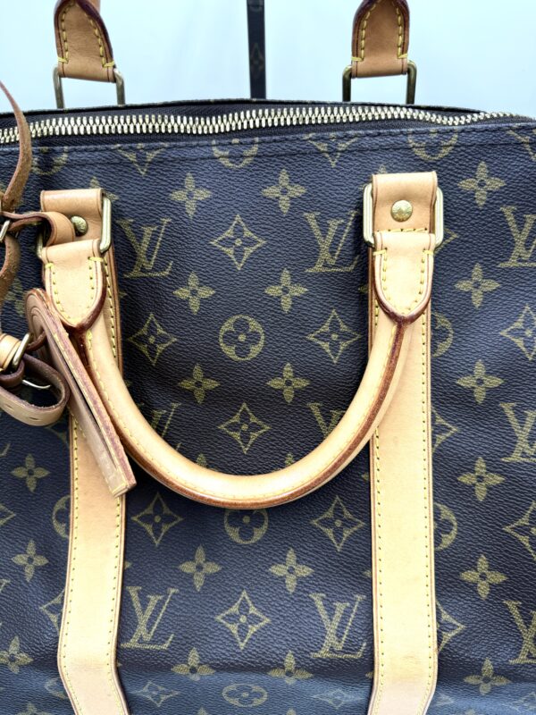 Authentic Louis Vuitton Keepall Bandouliere 50 with LV dustbag, LV tag, LV strap, and LV lock (attached with no key-on zipper pull like a charm) - Image 18