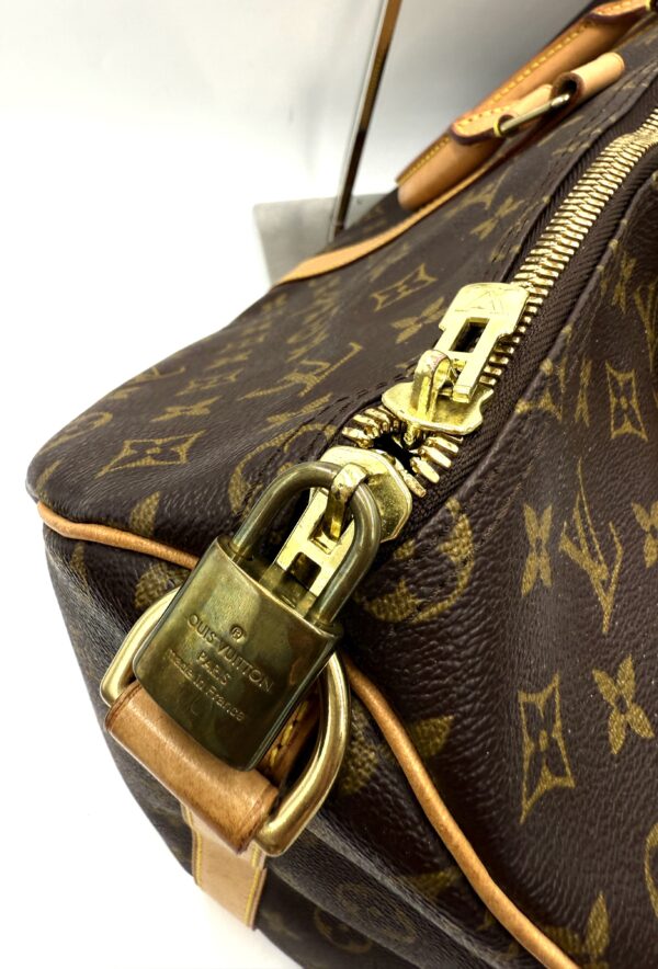 Authentic Louis Vuitton Keepall Bandouliere 50 with LV dustbag, LV tag, LV strap, and LV lock (attached with no key-on zipper pull like a charm) - Image 15