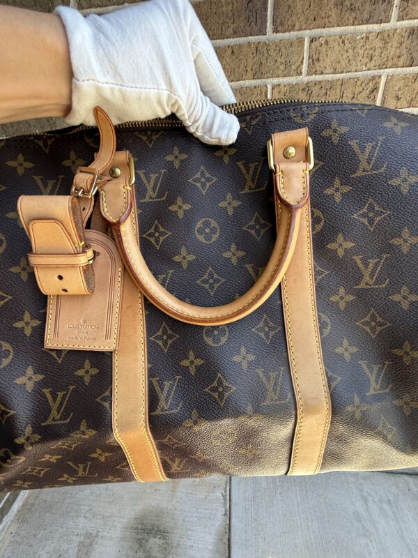 Authentic Louis Vuitton Keepall Bandouliere 50 with LV dustbag, LV tag, LV strap, and LV lock (attached with no key-on zipper pull like a charm) - Image 48