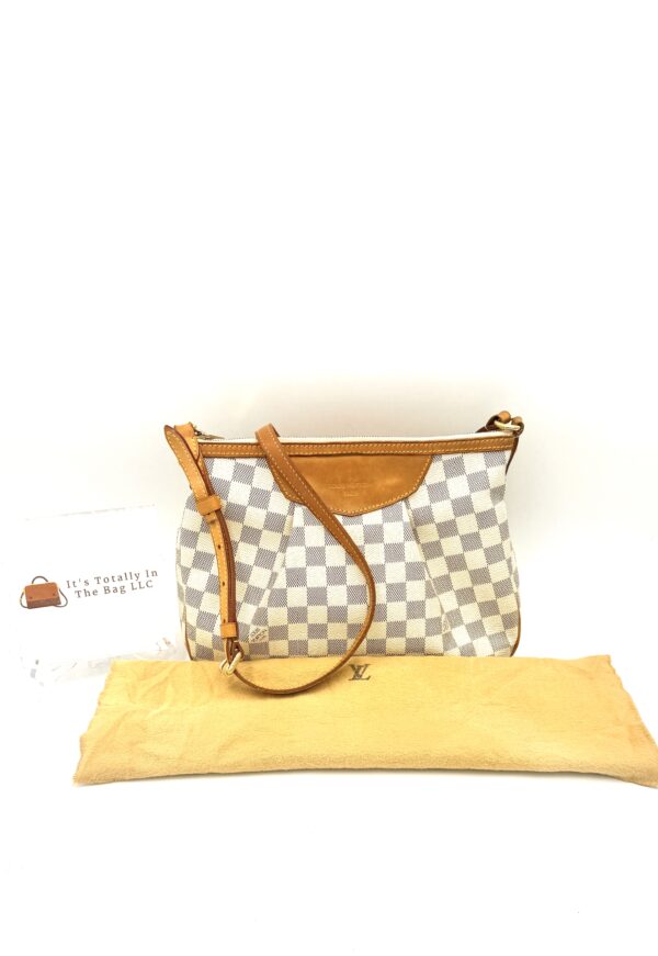 Authentic Louis Vuitton Siracusa PM crossbody with LV dustbag included