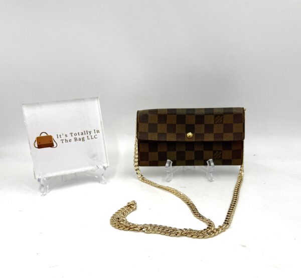Authentic Louis Vuitton Sarah wallet, Damier Ebene, with organizer to wear as crossbody and gold generic chain included